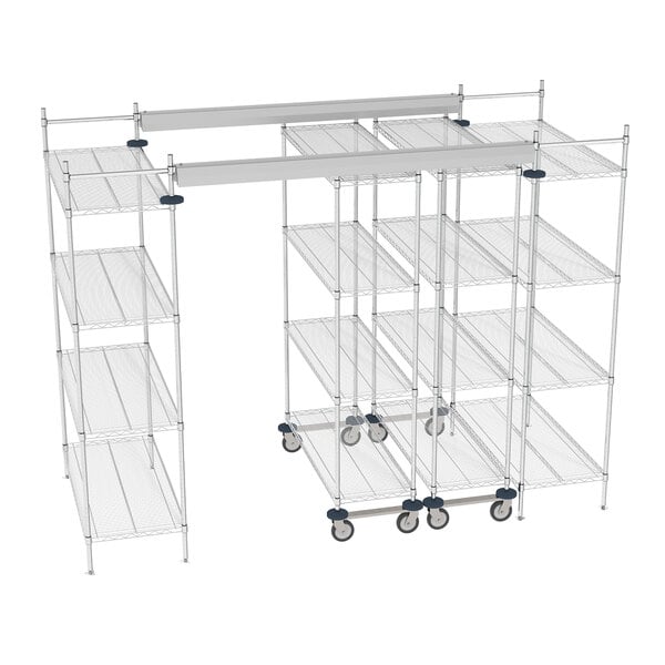 A Metro chrome top-track shelving unit with wheels and shelves.