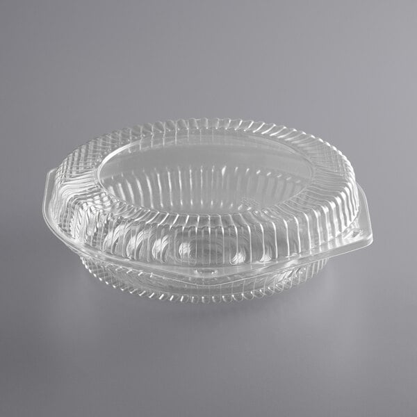 A clear plastic Choice pie container with a lid.