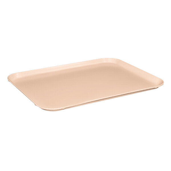 A peach rectangular fiberglass MFG Tray on a counter.