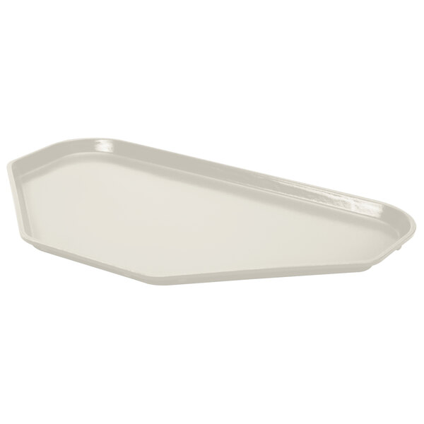 An eggshell white fiberglass trapezoid tray.