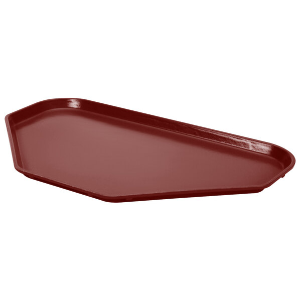 A burgundy trapezoid fiberglass cafeteria tray.