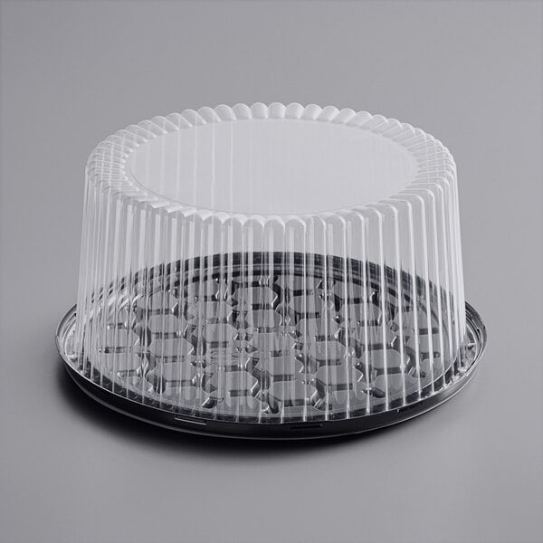 A Choice plastic cake display container with clear dome lid.