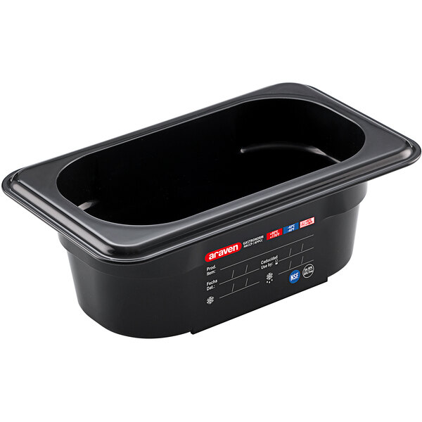 An Araven black plastic food pan with a lid.