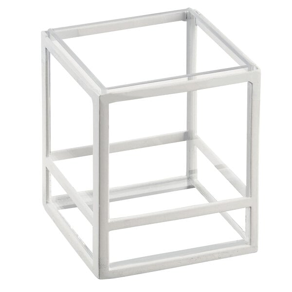 A white cube with a clear glass frame on top.