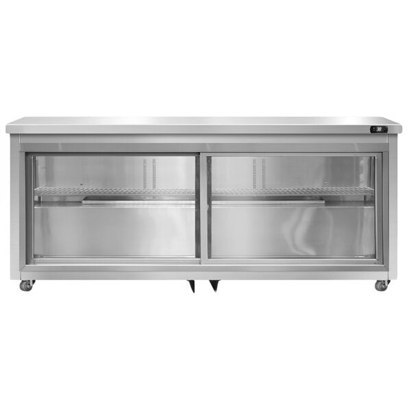A stainless steel Continental Refrigerator with sliding glass doors.