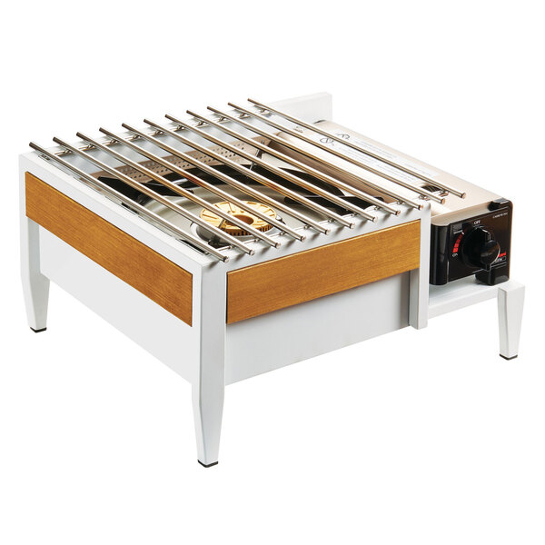 A white Cal-Mil Monterey butane stove frame with a metal grate.