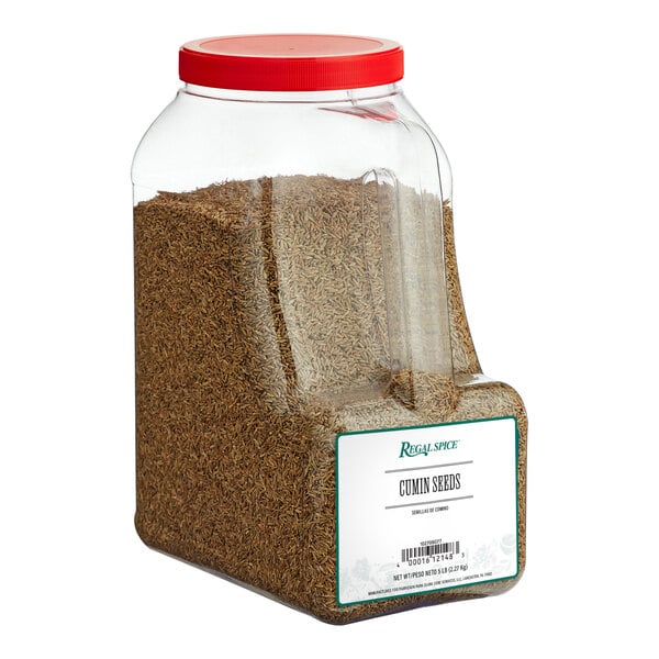 A large plastic container of Regal Cumin Seeds.