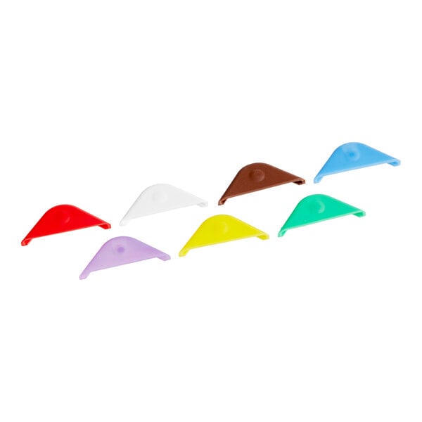 A group of colorful Araven plastic clips on a white background. The clips are red, yellow, green, blue, purple, and brown.