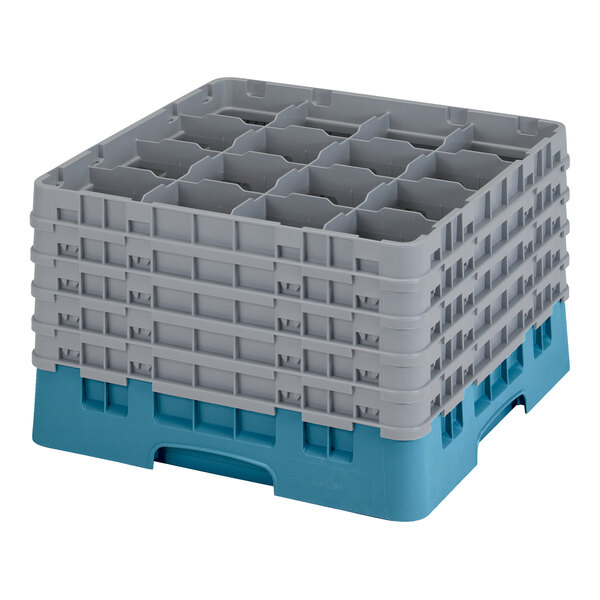 A teal and gray plastic glass rack with 16 compartments and five extenders.