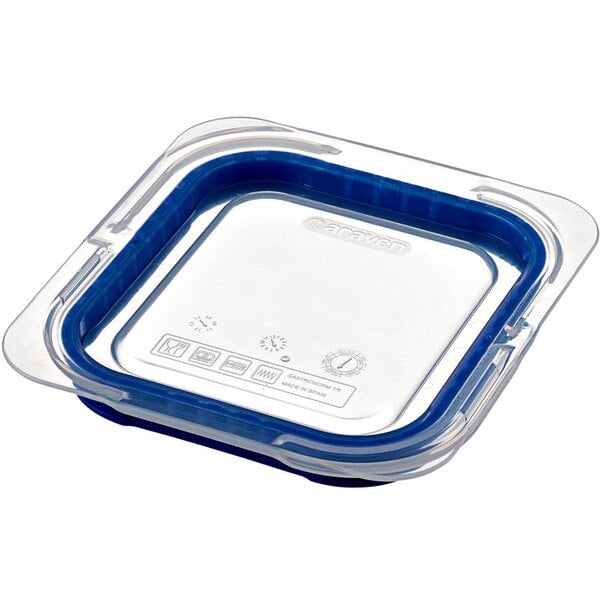 a plastic container with blue lid