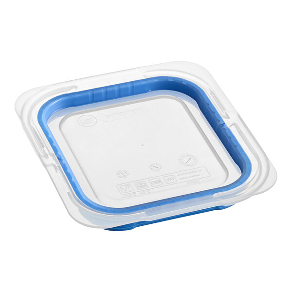 A clear Araven polypropylene lid for a 1/6 size food pan with blue trim.