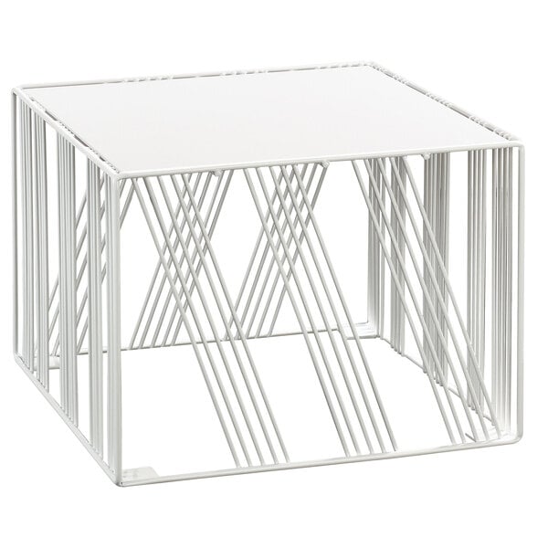 A white metal Cal-Mil Portland square display riser with geometric design.