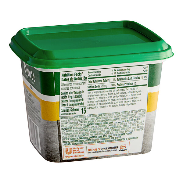 A container of Knorr Seafood Bouillon Base with a green lid.