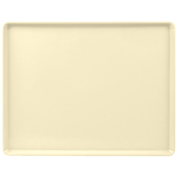 A white rectangular tray with a beige border.