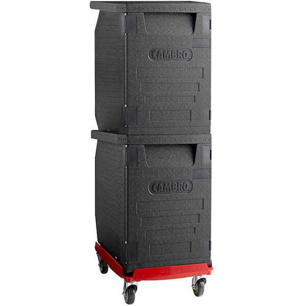 A black Cambro Cam GoBox Pan Carrier with wheels.