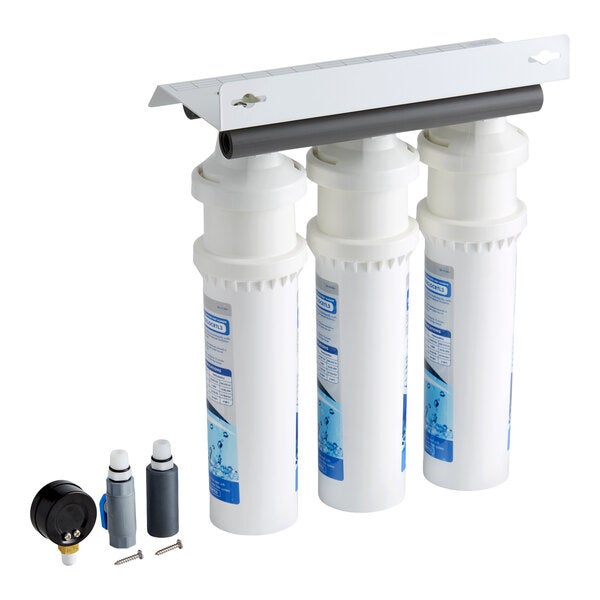 A triple water filtration system with three white filter cartridges, a mounting bracket, an outlet pressure gauge, and installation accessories.