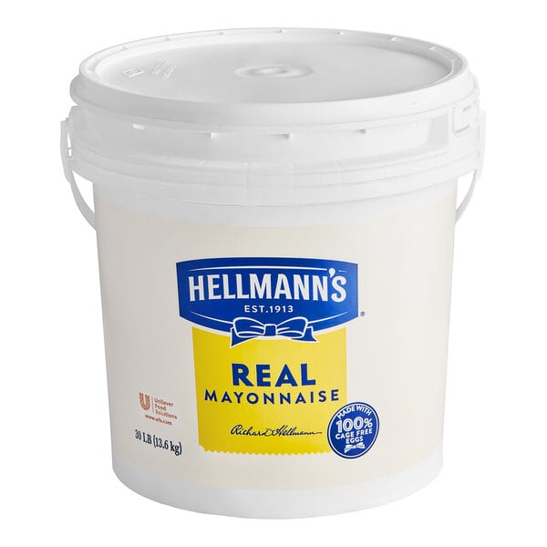 A white Hellmann's pail with a yellow label.