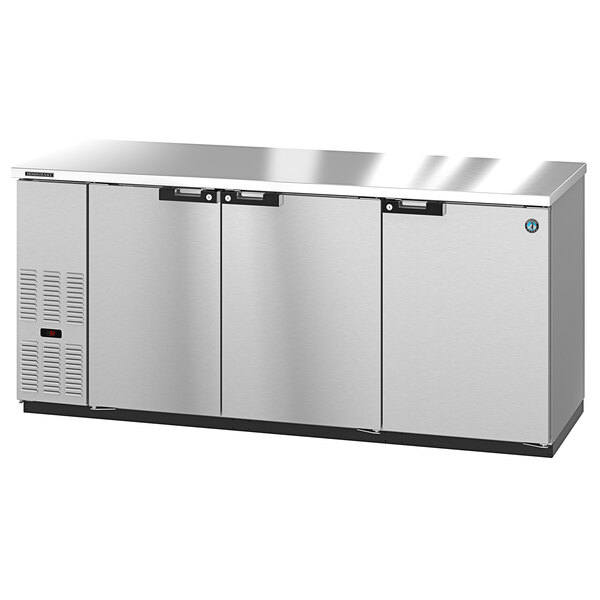 A stainless steel Hoshizaki back bar refrigerator with three doors.