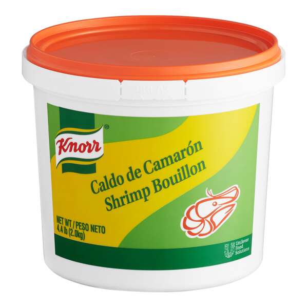 A white container of Knorr Caldo de Camaron Shrimp Bouillon with a green and yellow label.