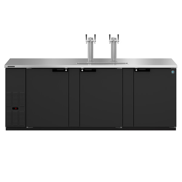 A black cabinet with a silver top and two beer taps.