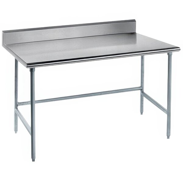 An Advance Tabco stainless steel work table with an open base and backsplash.