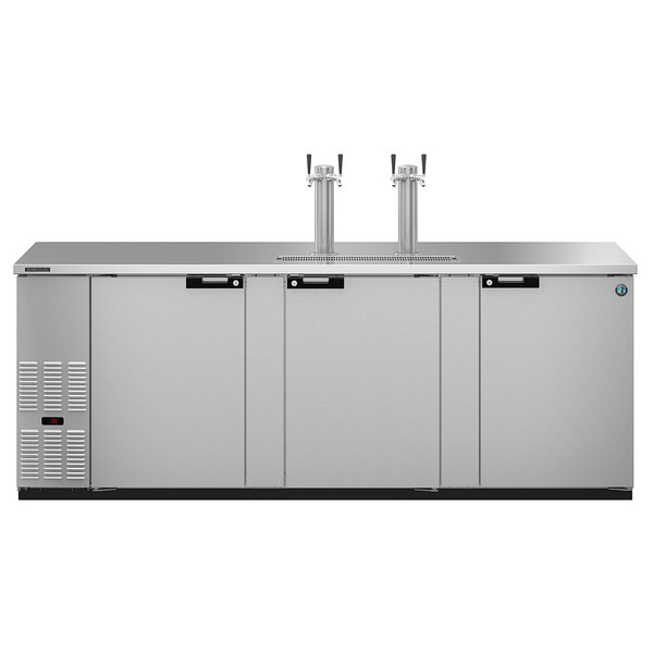 A stainless steel Hoshizaki beer dispenser with two taps.