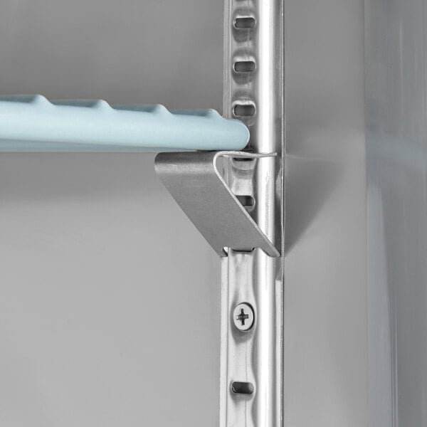 A metal shelf with a blue shelf bracket.
