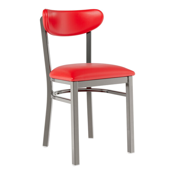 A red metal chair with a clear finish and red vinyl seat and back.