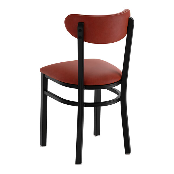 A black metal chair with a burgundy vinyl seat and backrest.