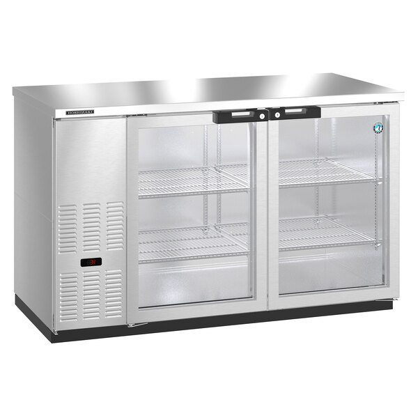 a stainless steel refrigerator with glass doors
