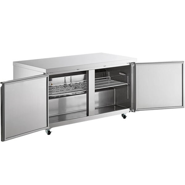 An Avantco stainless steel undercounter freezer with two doors open.
