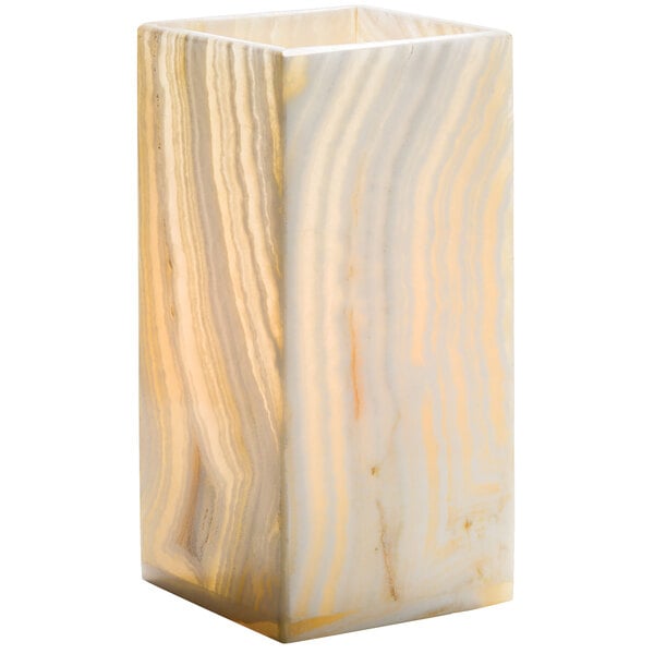 A rectangular alabaster lamp with a light inside.