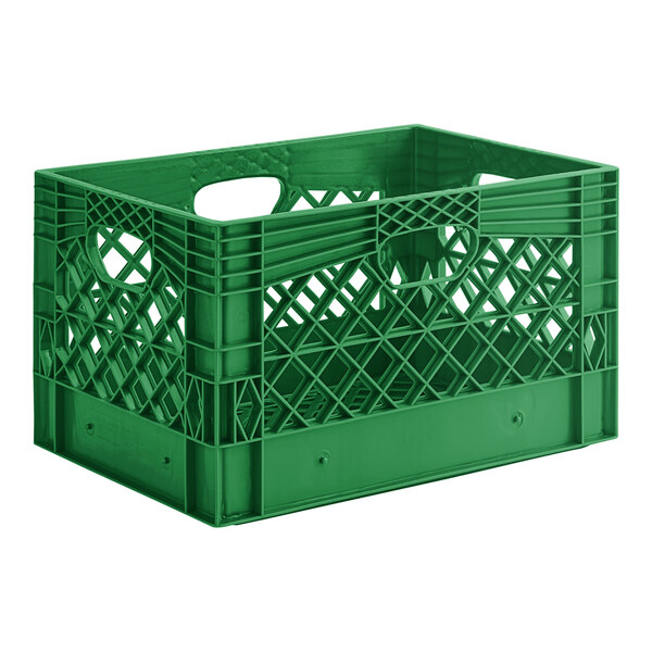 A green plastic rectangular milk crate with handles and holes.