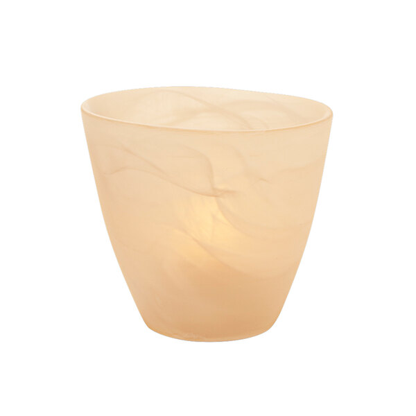 A Hollowick Wysp satin amber crystal candle holder with a lit white candle inside.