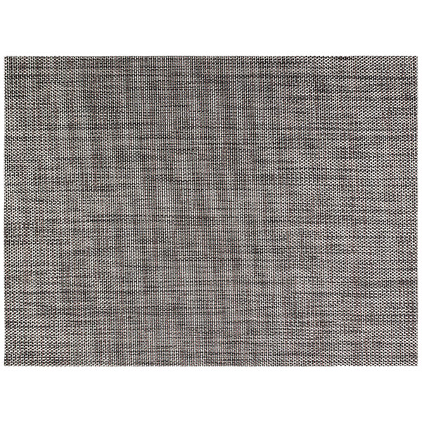 A close-up of a charcoal woven vinyl rectangle placemat with a black and white urban pattern.