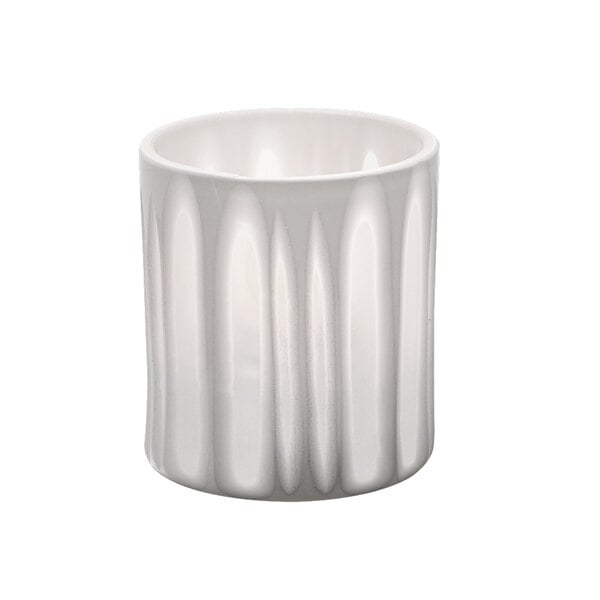 A white porcelain votive holder with a striped pattern.