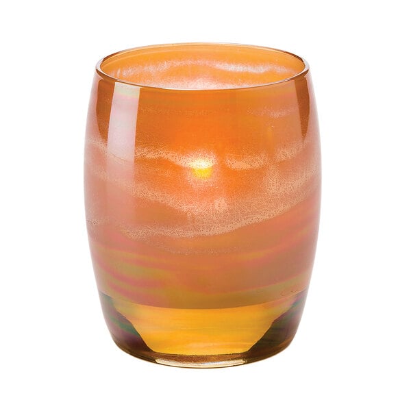 a glass with a candle inside