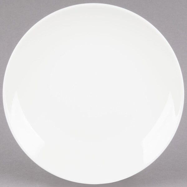 a white plate on a gray background