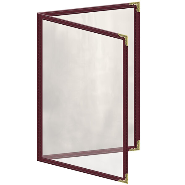A maroon menu cover with a glass window and gold decorative corners.