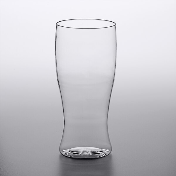 A Choice clear plastic pilsner glass on a table.