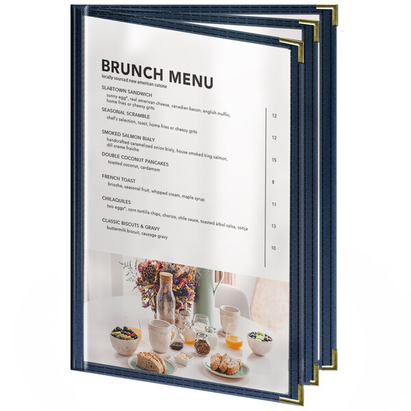 A blue H. Risch, Inc. menu cover with gold corners on a white table with a menu inside.