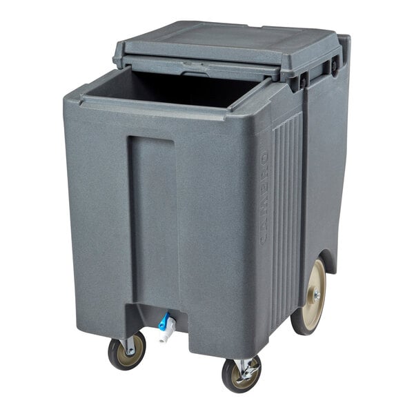 A large, gray, wheeled bin with a partially open sliding lid and a spout near the bottom.