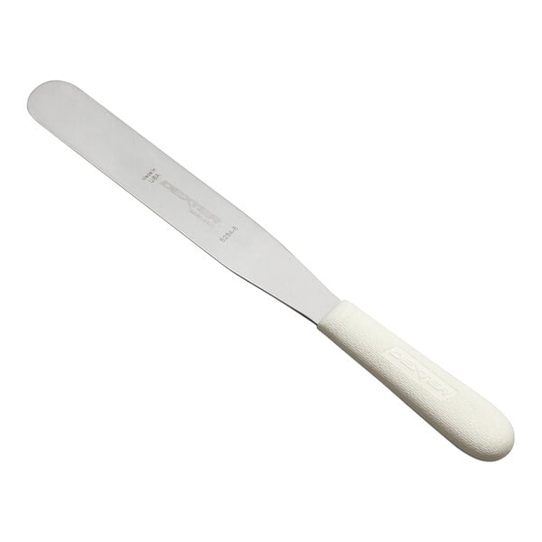 A metal spatula with a straight, rounded blade and a textured white handle.