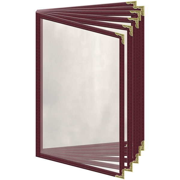 A maroon vinyl menu cover with gold decorative corners and a window.