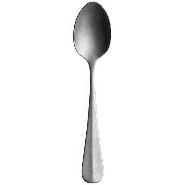 A Sola stainless steel teaspoon with a vintage stonewash handle.