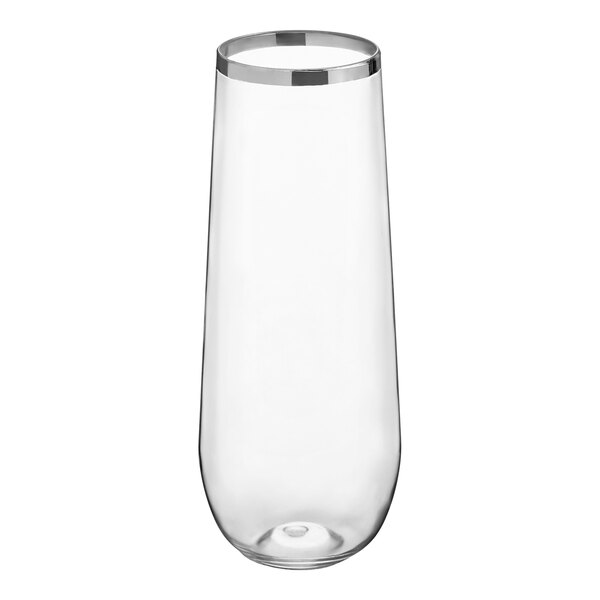 A clear, tall, stemless plastic champagne flute with a silver rim at the top.
