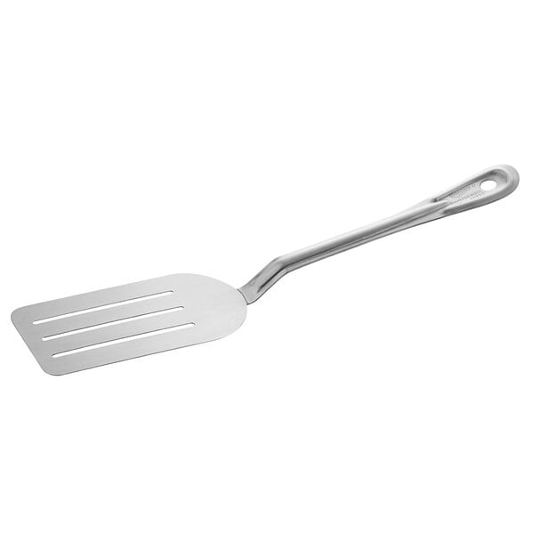 A close-up of a Vollrath stainless steel slotted spatula with a handle.