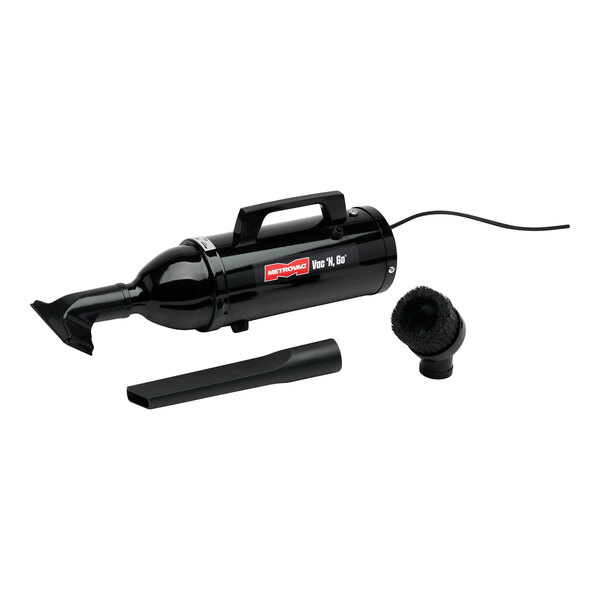 A black handheld canister vacuum cleaner with a handle, power cord, and two attachment accessories.