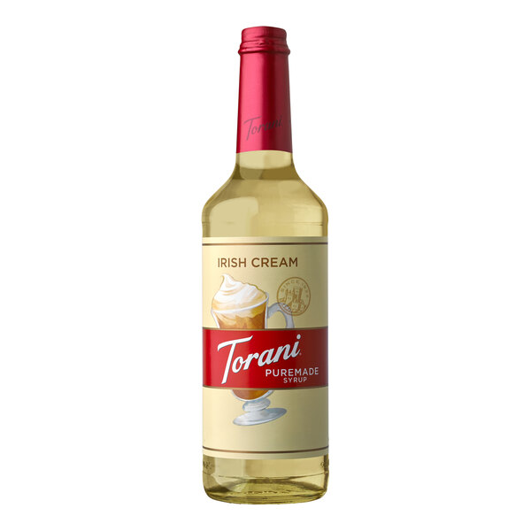 A Torani Puremade Irish Cream flavoring syrup bottle with a red cap and a picture of a cup of coffee.