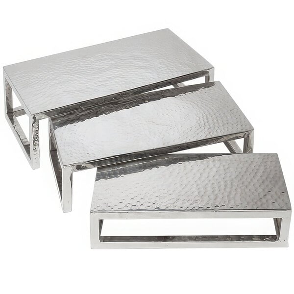 A group of American Metalcraft stainless steel rectangular display risers.